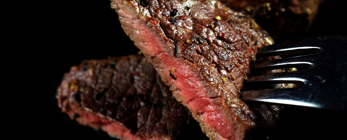 Seared steak with pink center