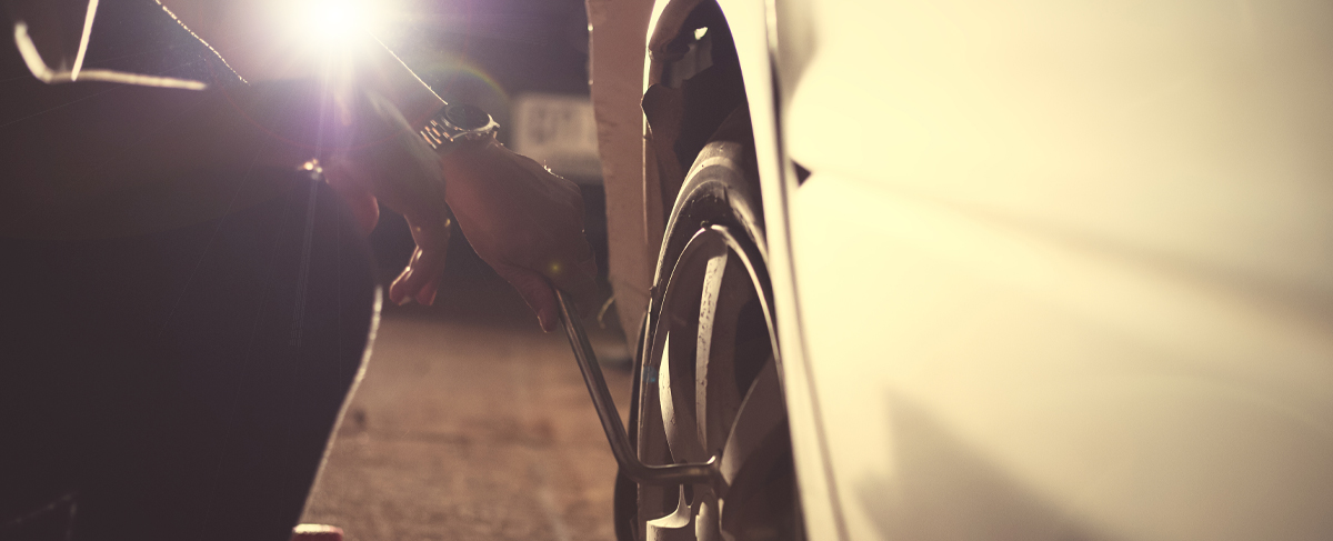 Man fixing a flat tire